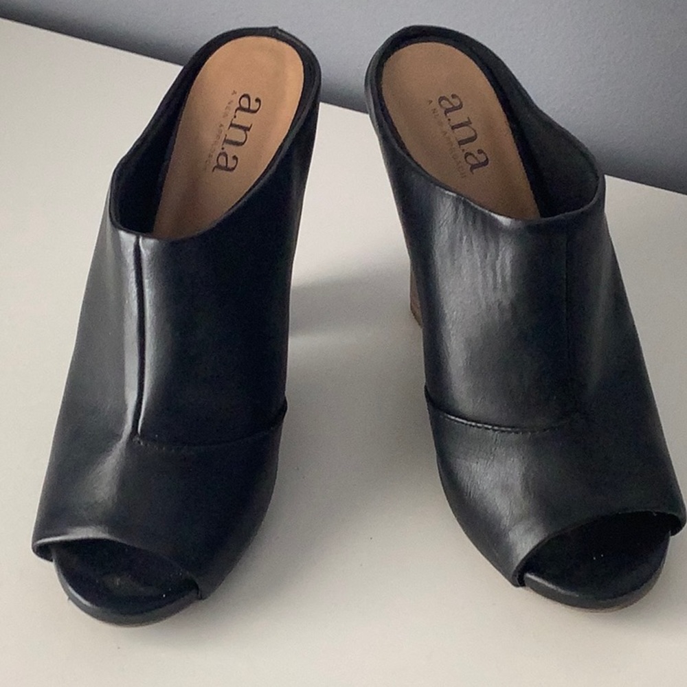 Black heeled slip on shoe